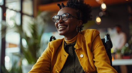 Fototapeta premium A woman sits at a table wearing a yellow jacket and glasses, focused on something
