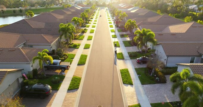 Large residential homes in southwest Florida gated community. American houses in rural US suburbs