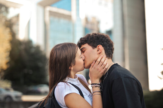 portrait of young couple embraced and kissing