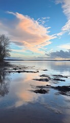 Serene Sunset Over Calm Lake with Pink Clouds Reflected in Water, Tranquil Evening Scene
