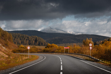 country road in autumn mountain landscape