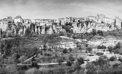 Cuenca, Castile-La Mancha, Spain: Houses hanging on a cliff edge in the old town of Cuenca in black...