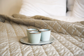 three cups of coffee in bed. Morning time