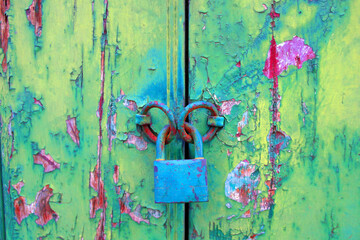 lock on a wooden painted door
