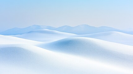 A vast, snow-covered landscape with rolling hills in the distance, bathed in soft, blue light. The snow is pristine and white, creating a sense of tranquility and peace.