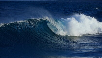 Fototapeta premium huge waves that destroy themselves in the shape of an arc in the dark blue ocean.generative ai