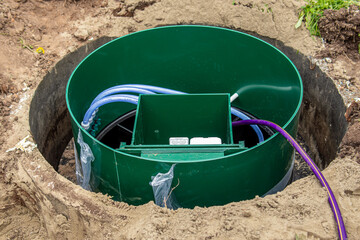 An open septic tank on the site. Septic tank design and internal communications
