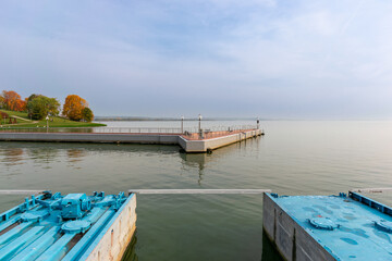 Pontoon bridge with a pier on the lake