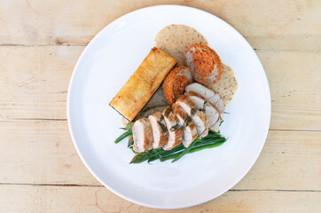 Pan fried pork fillet with dauphinoise potatoes and mustard sauce 