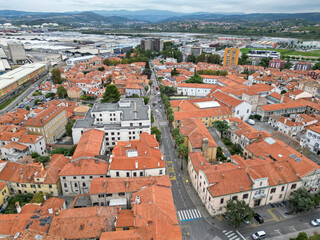 view of downtown koper slovenia (red roof buildings) scenic adriatic coast town streets square city center coastline europe european mediterranean sea mountains balkans venetian