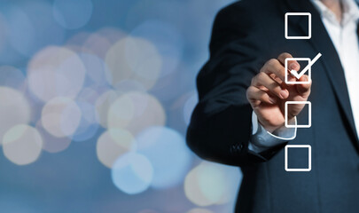 Checklist concept, Survey concept, Questionnaire with checkboxes, Online survey filling, Quiz question answering, Businessman checking checkboxes on virtual screen.