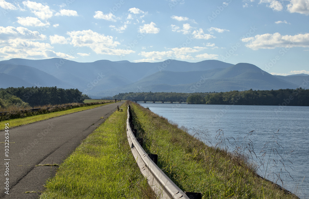 Wall mural steel beam rail road divider on ashokan reservoir promenade walking biking pedestrian leisure trail 