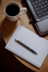 Writer's high: laptop, blank page and aromatic coffee. Coffee creative: ideas on a blank sheet with a coffee drink. Business in every shade: professional elegance in every frame.