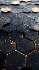 A close-up of the hexagonal tiles on a floor, each tile made up of gold and black metal, against a dark background