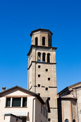 Urban landscape of Parma showing alley and cathedral's famous bell tower