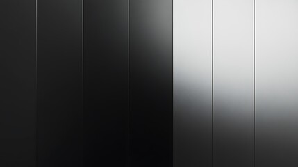 A close-up of a black and white striped wall, with the light shining on the white stripes.