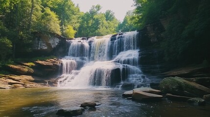 Fototapeta premium Waterfall Cascading Through Rugged Rocks in a Forest Setting