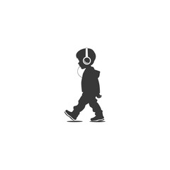 Obraz premium Silhouette of a Young Boy Walking with Headphones On