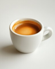 Fototapeta premium Rich espresso coffee shot with perfect crema in a minimalist white ceramic cup