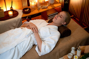 Caucasian woman customer enjoying relaxing anti-stress spa massage and pampering with beauty skin...