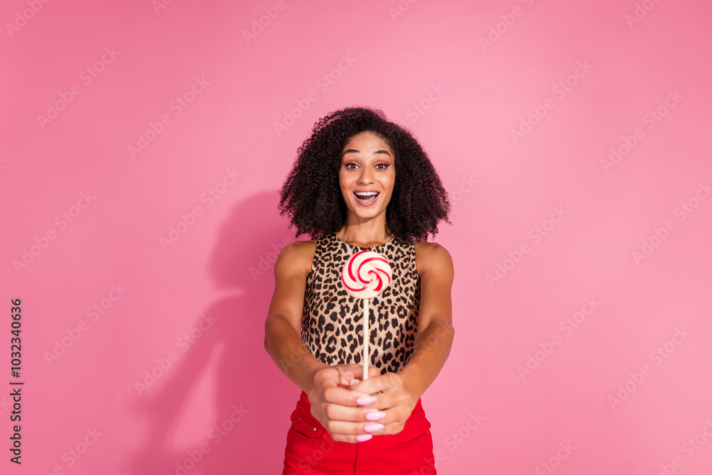 Poster Photo portrait of lovely young lady excited hold lollipop dressed stylish leopard print garment isolated on pink color background