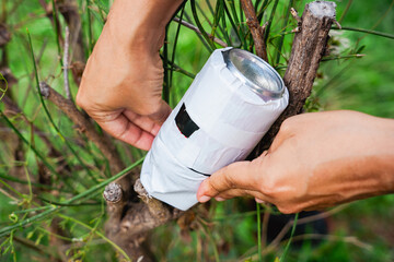 homemade pinhole camera or stenopeic camera, made with a can and installed in nature. Diy...