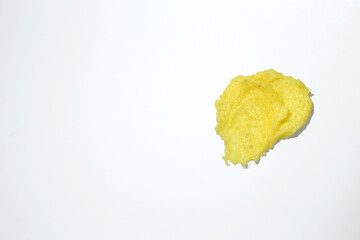 Smears of body scrub on white background. Fruit and berry body scrub texture of the swatch. Cosmetic smear