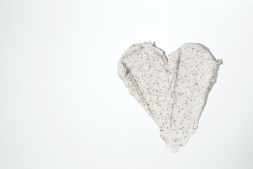 Smears of body scrub on white background. Fruit and berry body scrub texture of the swatch. Cosmetic smear