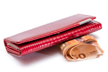Red Leather Women Purse with Fifty Euro Banknotes - Isolated on White Background. A Wallet Full of 50 Euro Paper Money Symbolizing Wealth, Success and Social Status - Isolation