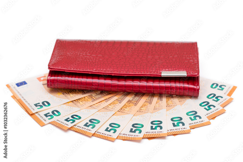 Wall mural red leather women purse with fifty euro banknotes - isolated on white background. a wallet full of 5