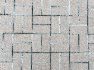 Urban Asphalt Aesthetics: Textured Paving Slabs in Gray and Black for Modern Construction Visuals