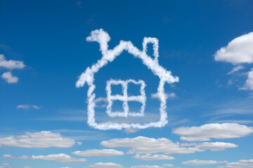 Obraz premium Artistic cloud formation resembling house against clear blue sky, whimsical and creative