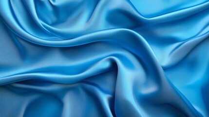 Obraz premium Silk blue satin fabric backdrop with smooth, shiny, soft texture in blue color, perfect for luxurious decoration