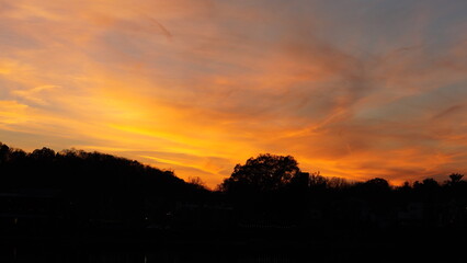 The beautiful sunset sky view with the colorful clouds as background