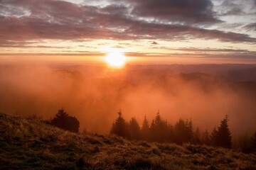 Fototapeta premium sunrise over the mountains, Dochia Chalet, Ceahlau Mountains, Romania 