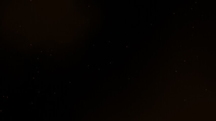 Gold glitter. Golden sparkle confetti. Shiny glittering dust. blurred sparks from fire in front of black background