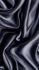 Black satin fabric with smooth, soft, shiny texture, ideal for luxury fashion, decoration, or backdrop