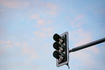 A non-functioning traffic light. Ampel. Symbolic off or stop with XXX symbolism