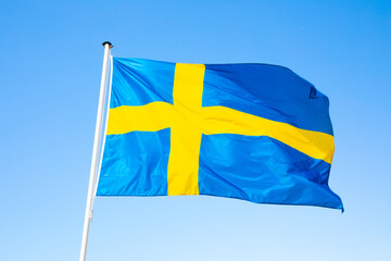 Swedish flag over blue sky