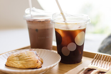 Breakfast set with coffee and pastry bread in a relaxing cafe