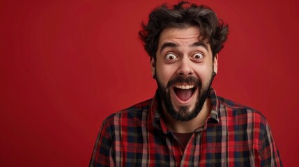 Obraz premium A man displaying surprise and amusement, raised eyebrows and wide grin