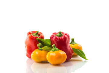 ripe red and yellow sweet peppers.