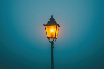 A Single Street Light Illuminated in Fog