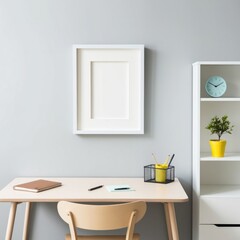 "A simple and bright office room with modern decor. The back wall is painted in light gray, with an empty white picture frame hanging in the middle. Below the frame, there is a light-colored wooden ta