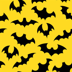 Yellow seamless pattern with black bats for Halloween