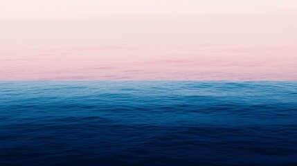Obraz premium Calm ocean reflects pink and blue hues at sunset, creating a serene atmosphere. Perfect for relaxing and unwinding, this image captures a romantic tropical paradise. Ideal for travel projects