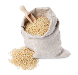 Raw couscous in burlap sack and scoop isolated on white