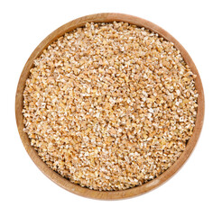 Dry wheat groats in wooden bowl isolated on white, top view