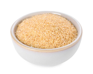 Raw wheat groats in bowl isolated on white