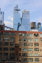 Fototapeta premium New York, NYC, Manhattan, building, architecture, city, skyscraper, apartment, urban, glass, buildings, window, exterior, facade, high, construction, windows, tower, house, new, tall, home